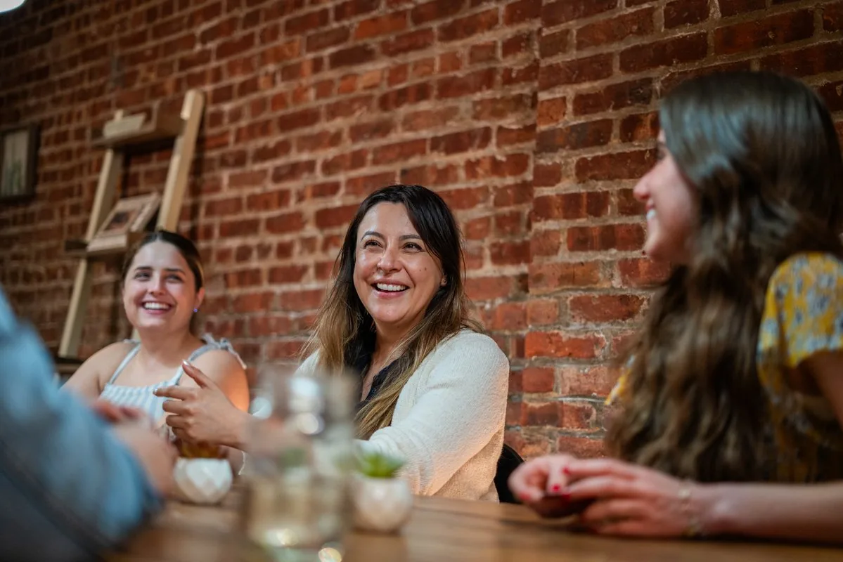 Hoboken Grace dinner group members gathering together from 2024