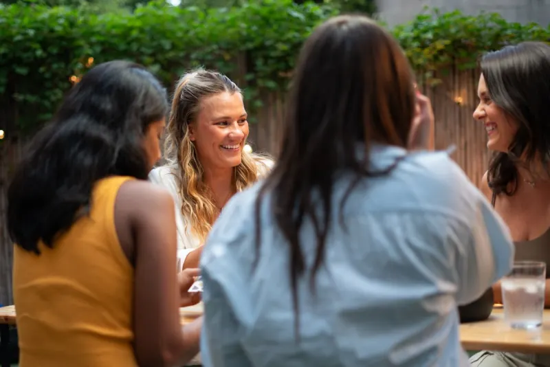 Hoboken Grace dinner group members gathering together from 2023